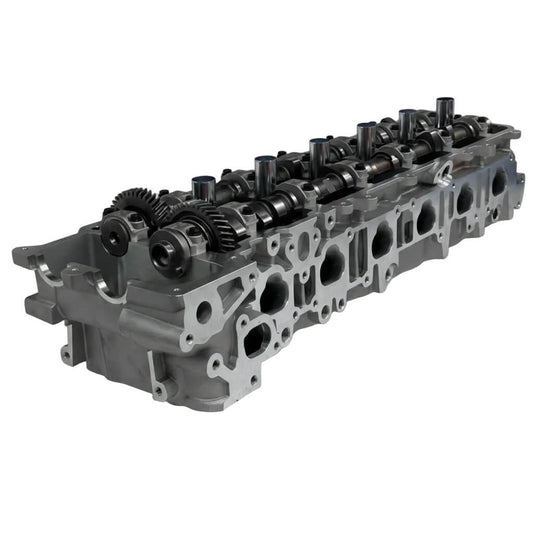 Cylinder head for Landcruiser 1FZ-FE 100 Series on a white background
